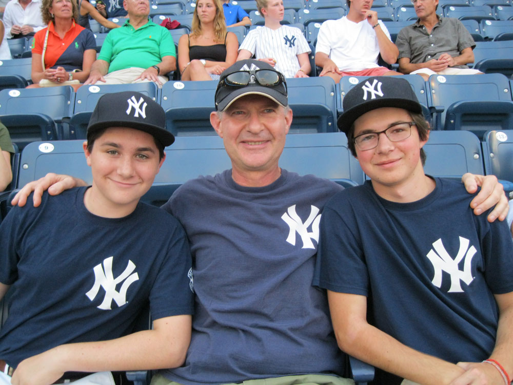 A New York Yankee family - John David, John, and Frank. I must have been looking at the scoreboard!